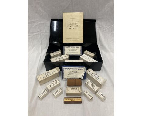 A VINTAGE FIRST AID KIT IN A BLACK TIN WITH ORIGINAL CONTENTS 