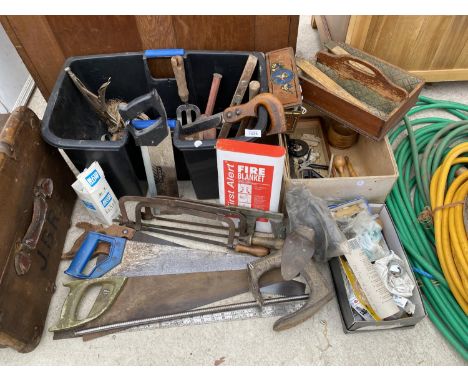AN ASSORTMENT OF VINTAGE TOOLS TO INCLUDE SAWS AND A COBBLERS LAST ETC 