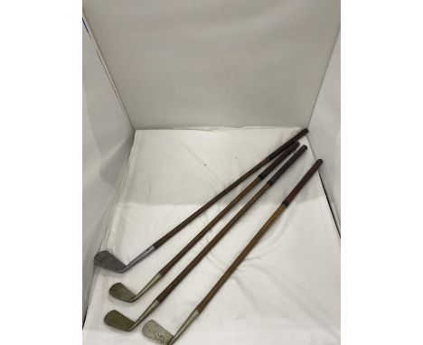 FOUR VINTAGE GOLF CLUBS WITH HICKORY SHAFTS, THREE 'SHELL' AND ONE 'THORNTONS' 