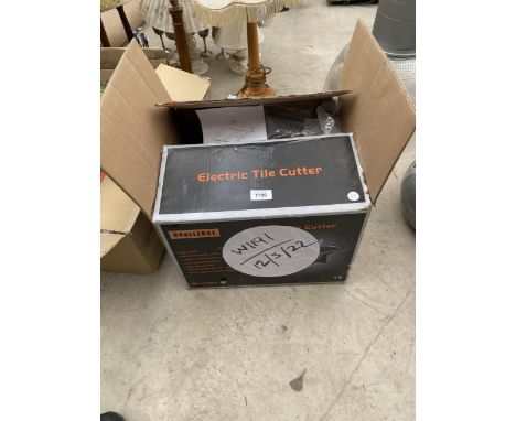 A BOXED ELECTRIC TILE CUTTER WITH INSTRUCTIONS 