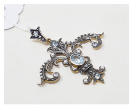 A 9ct gold, silver, blue topaz, and pearl pendant

 