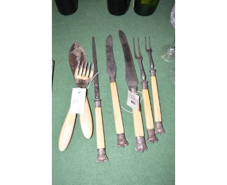 A Harrison Bros. & Howson carving set, with silver mounts and bone handles; together with a pair of EPNS plated fish servers 