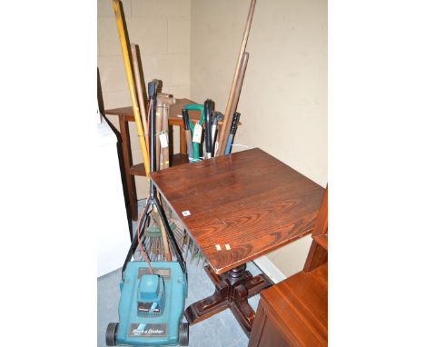 A stained wood table on centre stalk; and a corner table with shelf under.