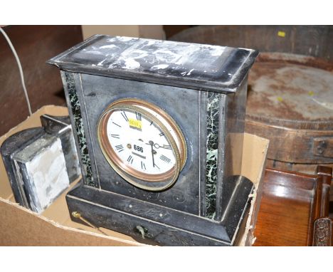 A Victorian mantel clock in black slate and marble architectural style case (case complete but some parts detached).