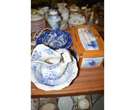 A 19th Century blue and white Delft ware rectangular box with wooden trim and hinged cover (damaged and riveted back together