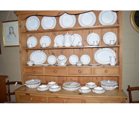 A Spode fleur-de-lys gold dinner and coffee service, fifty-four pieces.