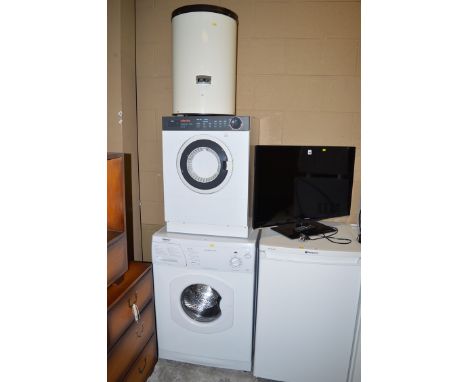 A Hotpoint Aquarius 1100 washing machine; an Electra Compact 28 dryer; and a Zanussi spin dryer.
