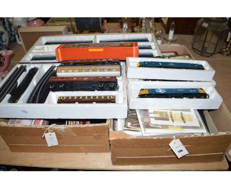 A large quantity of model railway equipment in 00-gauge, comprising: a Wrenn W2230 diesel/electric locomotive; a LIMA diesel 