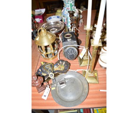 A pair of Corinthian column style brass candlesticks; a carriage lamp; a pair of oak spiral twist candlesticks; a brass lante