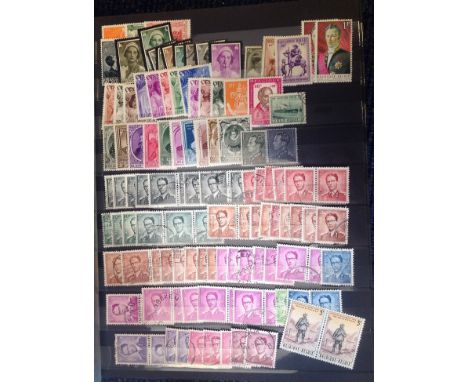 Large stamp collection in blue stock book.  Assortment of mint and used.  Includes stamps from Belgium, Isle of Man, GB and B