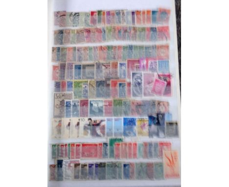 Worldwide collection in large stock book 50 pages crammed with stamps from around the globe some duplication countries includ