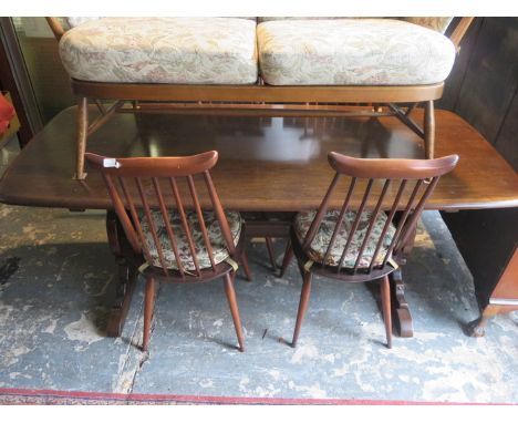 ERCOL OAK REFECTORY STYLE TABLE AND FOUR STICK BACK CHAIRS 