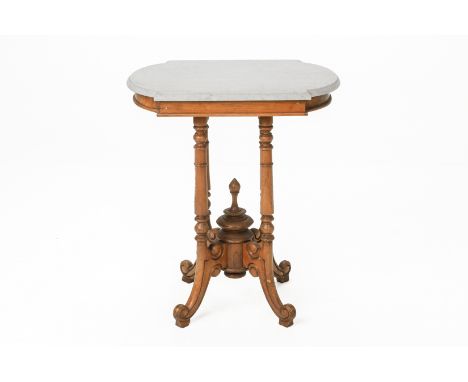 A MARBLE TOP SIDE TABLE
The rectangular top with rounded ends, raised on turned supports and scroll feet
70cm H x 60cm W x 40