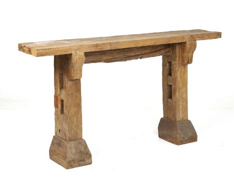 A RECLAIMED WOOD CONSOLE TABLE
The rectangular top on two openwork supports
86 x 159 x 28cm
Condition: For a condition report