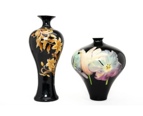 TWO LARGE BLACK GLAZED VASES
With floral decoration
Tallest item measures 60cm high
Condition: Minor signs of wear commensura