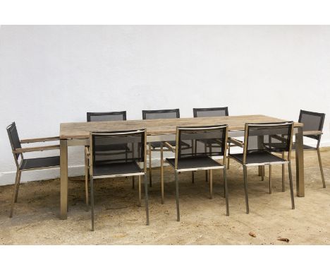 *A TEAK &amp; MAHOGANY OUTDOOR TABLE AND EIGHT CHAIRS
The rectangular table with plank top and on metal frame
The table 79cm 