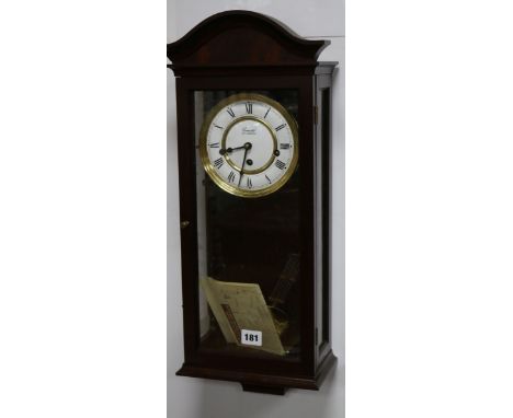 A Committee of London wall clock length 58cm