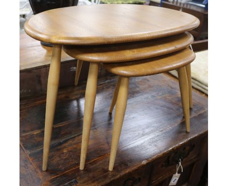 Three graduated Ercol Pebble tables W.66cm