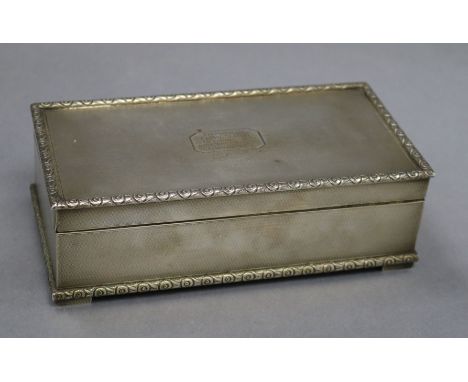 A George V engine turned silver cigarette box, London 1929 7.25in.