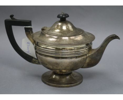 A silver teapot by MH & Co. Ltd, Sheffield 1923