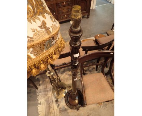 Carved oak standard lamp