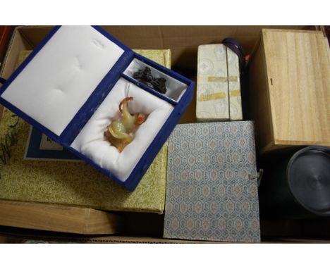 A quantity of modern Chinese ornaments to include faux jade vase and cover, boxed hardstone carvings etc