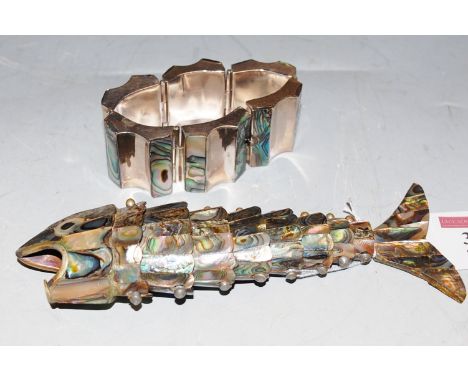 A mid 20th century paua shell reticulated fish together with similar bangle (2)