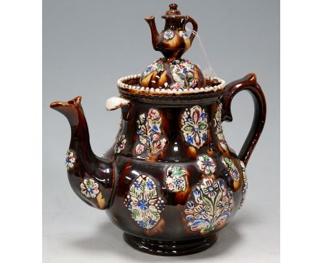 A Victorian Bargeware teapot and cover