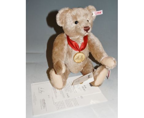 A modern Steiff collectors bear 'The bear of the year 2011', with supporting certificate of authenticity 