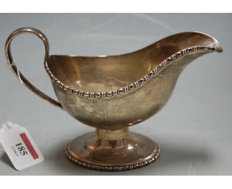 A George V silver pedestal cream jug, having egg and dart cast rim, 7.3oz, Chester 1923  Condition Report / Extra Information