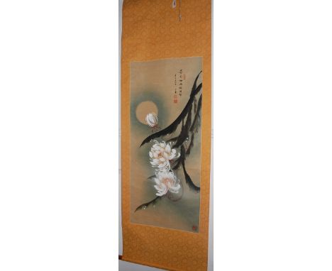 An early 20th century Chinese scroll painting, depicting lotus flowers and raindrops with calligraphy and seal marks, waterco