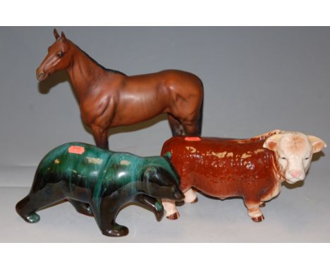 A Beswick model of Arkel The Champion Steeplechaser, matt finish on wooden plinth, Melba ware Highland Bull, and a drip glaze