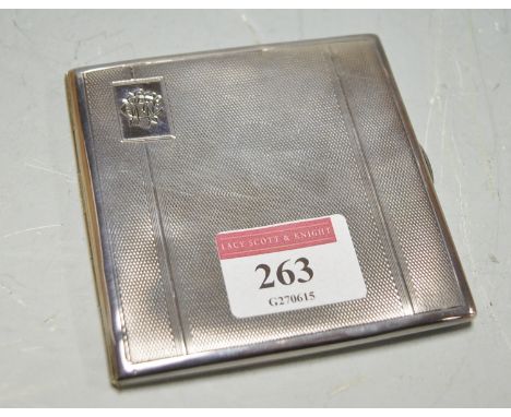 A mid-20th century silver pocket cigarette case with engine turned decoration 