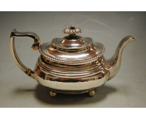 An early 19th century silver teapot of oval bombe form, 11.5oz (a/f)