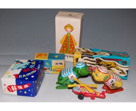 Mixed lot of children's toys to include Japanese tin plate model of a frog etc