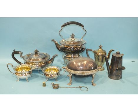 A silver-plated tea service and matching spirit kettle on stand, a small plated breakfast dish and a quantity of plated cutle