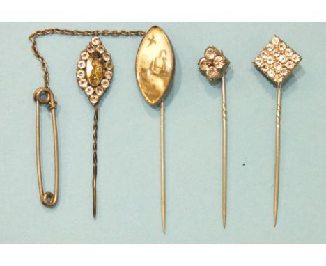 A Georgian memorial silver stick pin, the navette-shaped ivory panel painted to depict a young woman seated, holding a wreath