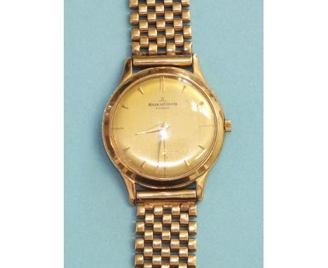 A gentleman's Jaeger LeCoultre Automatic 9ct gold wrist watch, the circular gilded dial with dart numerals and seconds subsid