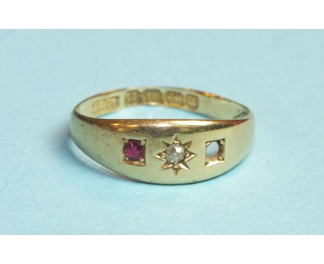 An 18ct gold gypsy ring set a diamond and one ruby, (other setting vacant), size L, 2.6g.