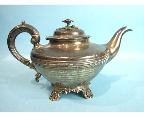 A Victorian silver compressed teapot, the hinged lid with flower finial, raised on shell and foliate cast feet, London 1840, 