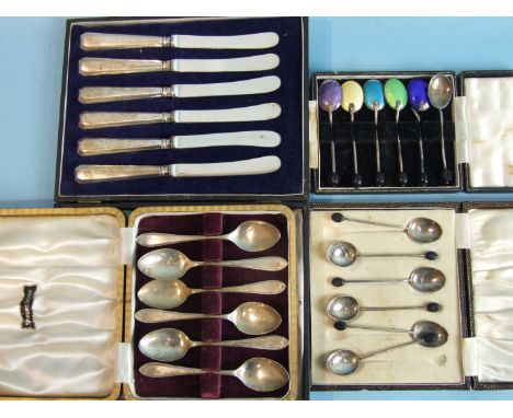 A set of six teaspoons, Sheffield 1953, a set of six bean spoons, a set of six silver-handled knives, weighable silver ___3oz