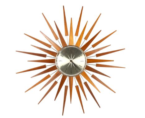 A mid century sunburst quartz clock, Seth Thomas, Scotland, diameter 66cm 
