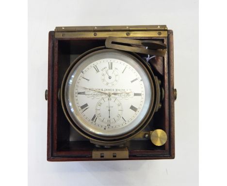 Marine chronometer by Kelvin & James White Limited, Glasgow, No.8430, with two subsidiary dials, on brass gimbal, in mahogany