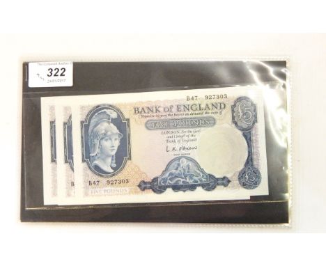 Three Bank of England £5 notes, Helmeted Britannia Issue, February 1957, signed by L K O'Brien, all ef, and another £5 note w