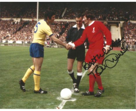 Tommy Smith Liverpool Football legend signed 10 x 8 inch colour photo.  Good Condition. All autographed items are genuine han