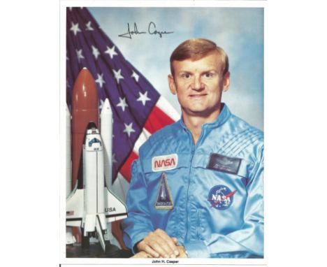 Astronaut John Casper signed 10 x 8 inch colour portrait photo Space Shuttle NASA.  Good Condition. All autographed items are