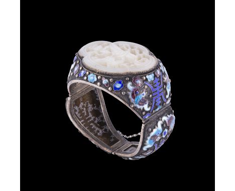 A CARVED JADE, ENAMEL AND SILVER BRACELET  清代 银烧蓝嵌如意形莲纹玉手镯  China, Qing dynasty.  W: (jade)5.4cm