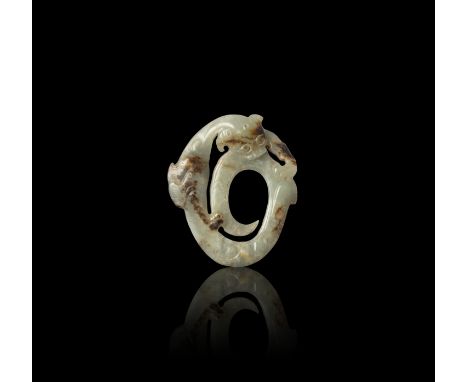 A CELADON WITH BROWN RUSSET JADE DRAGON PENDANT  漢代 青玉咬尾龍珮  China, Han dynasty (202 BC–220 AD)  Made of smooth celadon nephri