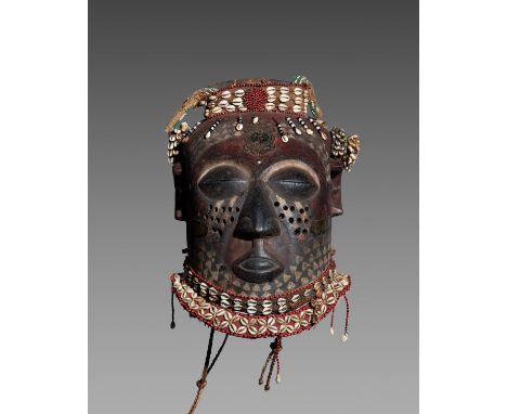KUBA MASK  Democratic Republic of Congo  Wood, shell  H.35cm  NOTE  The Kuba live in the Lower Kasai region of central Zaire 