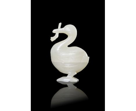 A CELADON RUSSET HERON SHAPED JADE BOX  清代 青玉帶沁色一路連科蓋盒  China, Qing dynasty  Exquisitely crafted in the form of a standing he
